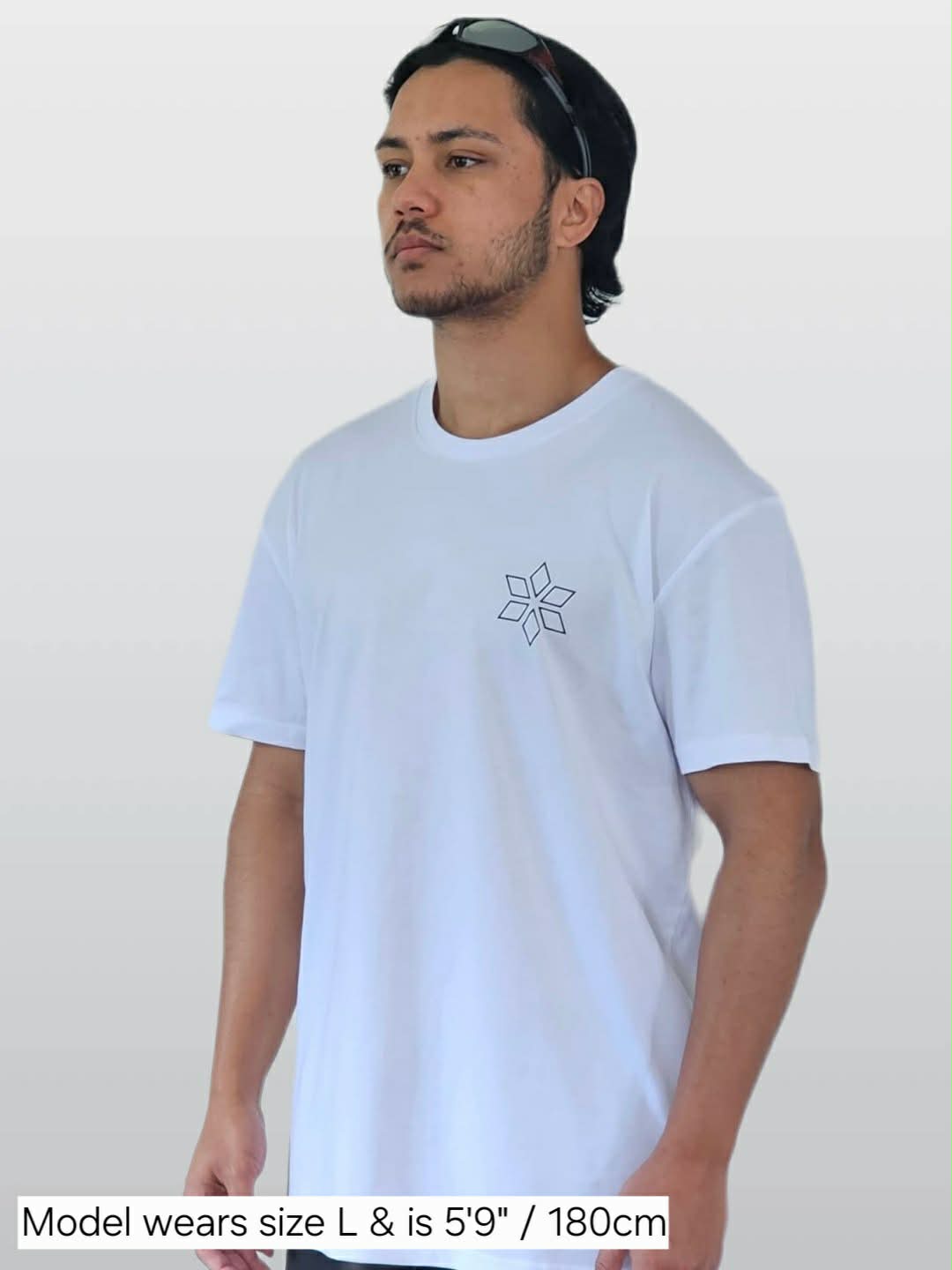 Man wearing classic white t-shirt NZ Maori star design