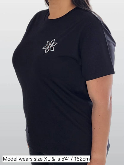 Woman wearing classic black t-shirt with star design NZ