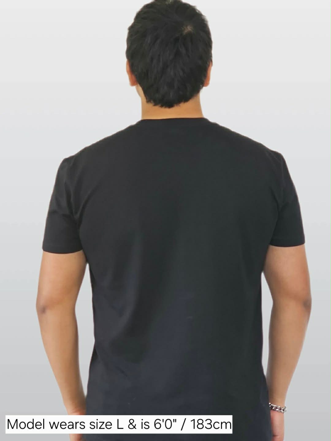 Man wearing classic black t-shirt NZ Maori