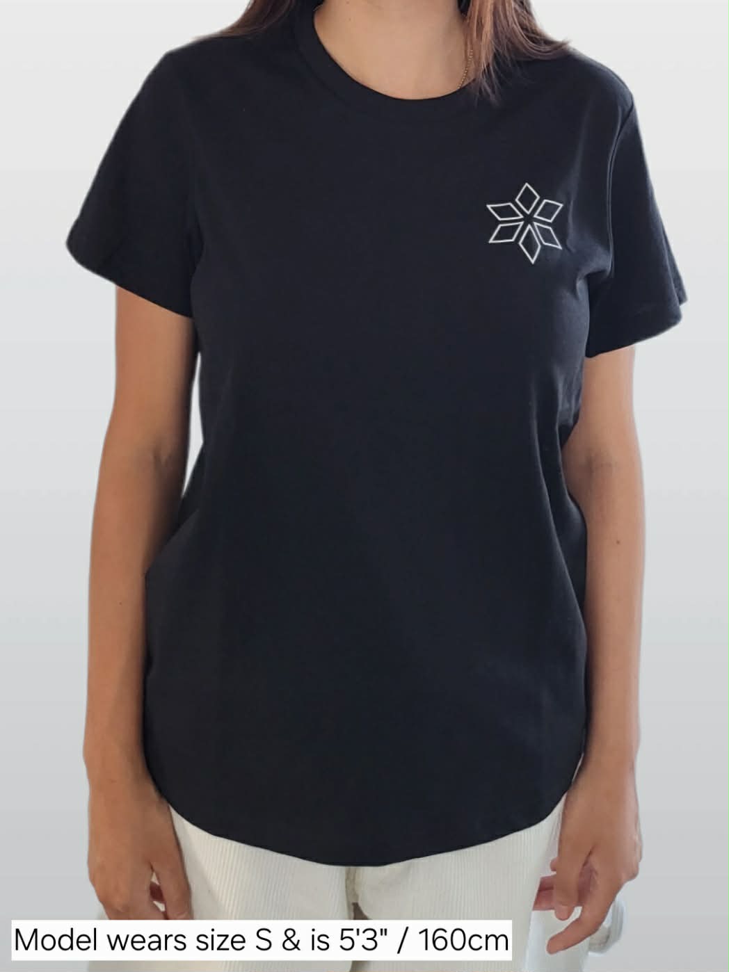 Woman wearing classic black t-shirt with star design NZ